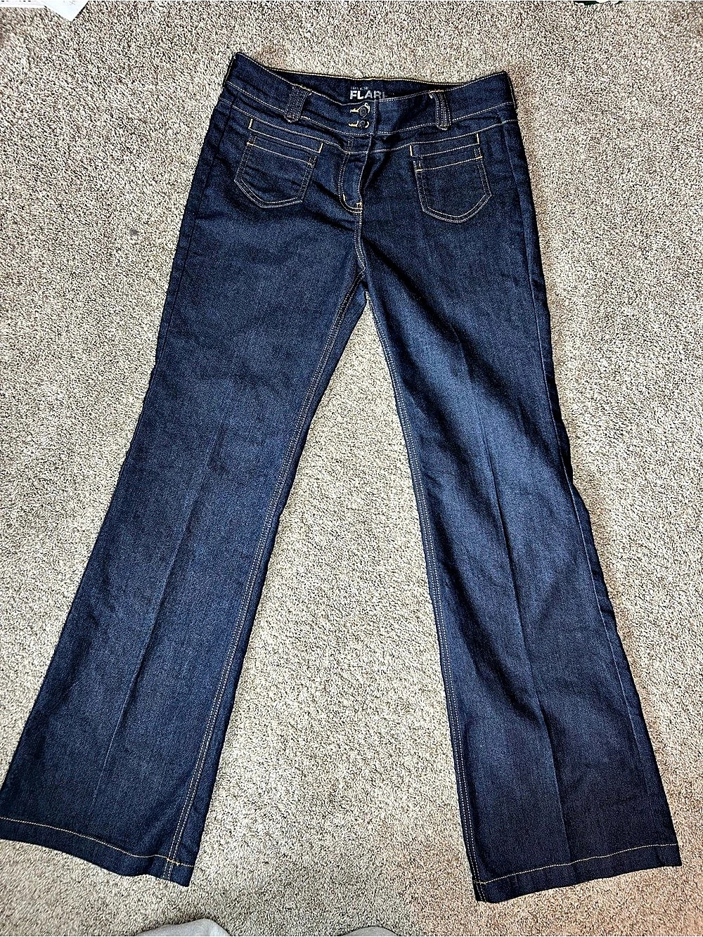 New York and Company Flare Jeans in a dark blue wash. Like New